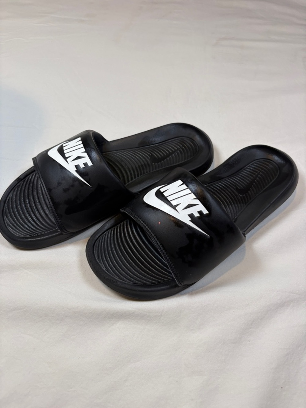 Women’s Nike Black and White Logo Slide Sandals